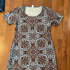 Adorable dress with unique pattern.